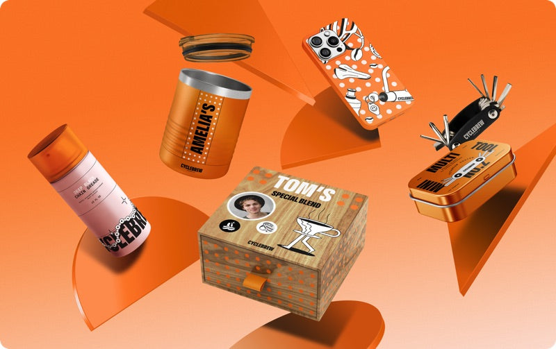 Branded merchandise set — tumbler, phone case, tin and gift box printed on the BD Series